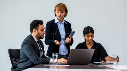 Diverse colleagues gather in brainstorm discuss statistics together. Group of people colleagues gather doing Brainstorming business plan together. Team Brainstorm Working Concept.