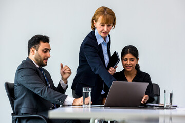 Diverse colleagues gather in brainstorm discuss statistics together. Group of people colleagues gather doing Brainstorming business plan together. Team Brainstorm Working Concept.