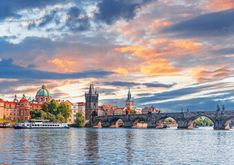 Prague - Charles bridge, Czech Republic. Scenic aerial sunset on the architecture of the Old Town...
