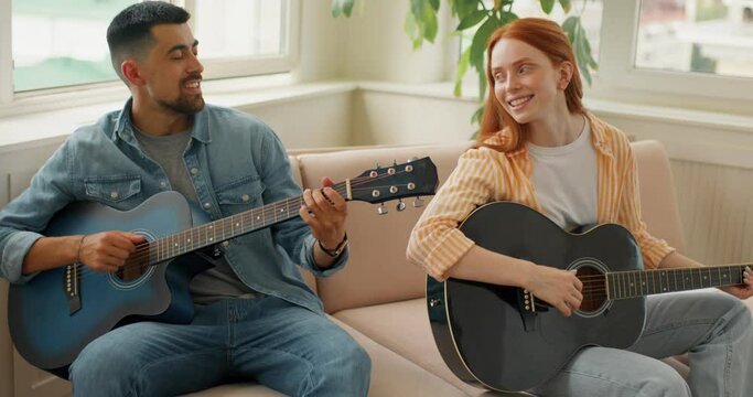 two awesome young people get plasure from singing enjoying weekend holiday day off. happiness slow motion music lovers love