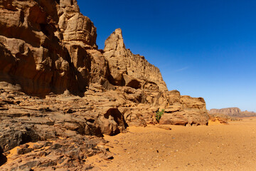 Amazing red rock formation. Sandstone  rock formations. Tamezguida or "The Cathedral" (La Cathedrale).  Tassili N'Ajjer National Park, Sahara, Algeria, Africa