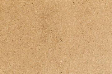 Pressed beige chipboard texture.