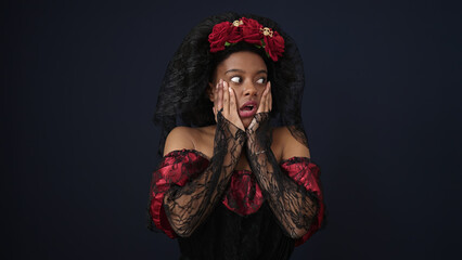 African american woman wearing katrina costume standing with surprise expression over isolated black background