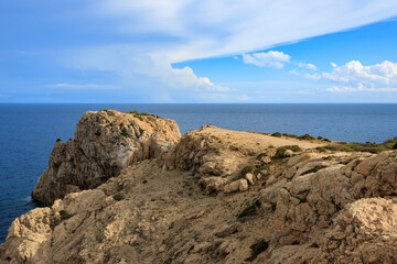 Fototapeta na wymiar Rocky coast of the mediterranean sea in Cala Ratjada, Mallorca, Spain.