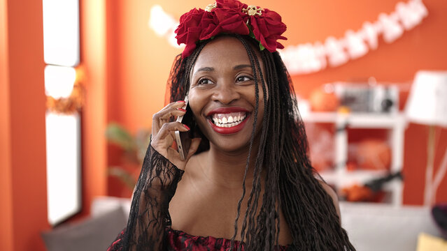 African Woman Wearing Katrina Costume At Home