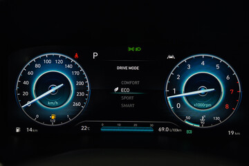 Close up shot of digital speedometer  in modern car console. Console panel of the car.