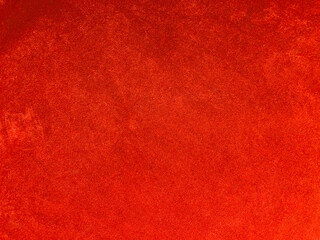 Orange velvet fabric texture used as background. Empty Orange fabric background of soft and smooth...