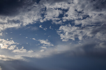 Obraz premium White clouds on sky at daytime, natural background 