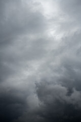Natural background with dramatic and rainy grey clouds on sky