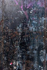 Weathered metal panel background texture with scratches and rust.