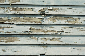 Peeling paint wooden wall.
