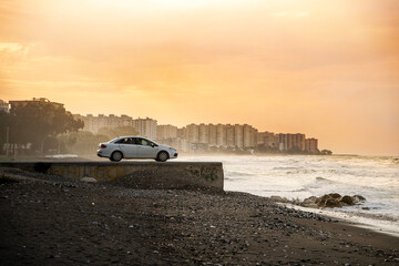 Fototapeta na wymiar car on the beach