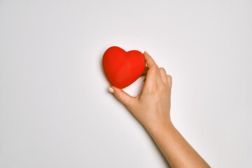 hands holding red heart, health care, love, organ donation, mindfulness, wellbeing, family insurance and CSR concept, world heart day, world health day, world mental health day, praying concept