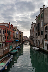 Fototapeta na wymiar Venice, view of a canal at sundown, epic scenery of venetian panorama.