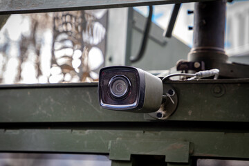 A video camera on a military vehicle for review and surveillance.