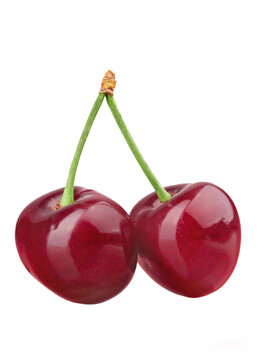 Ripe fresh red cherry isolated on white background. File contains clipping path.