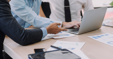 Entrepreneurs and business people conference in modern meeting room, happy multiracial coworkers have fun cooperating working together at office meeting, asian teamwork concept