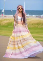 Fototapeta premium Beautiful girl wearing a cute summer dress in the summertime
