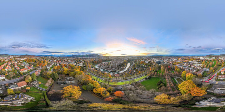 Seamless spherical HDRI aerial panorama 360 degrees for VR virtual reality of Bern town historic cityscape, Capital city of Switzerland with colorful twilight romantic sky sunset cityscape in autumn.