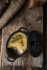 Meat rillette pate paste on a wooden table