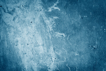 Grunge scratched blue wall texture background.