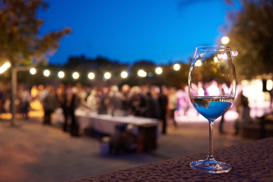 image of a glass of white wine with an event fodo