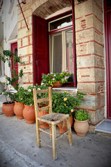 Vacation destination Chios / Greece: House facade with colorful door in the picturesque village of...