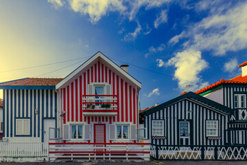 Striped colorful houses at the Praia da Costa Nova
