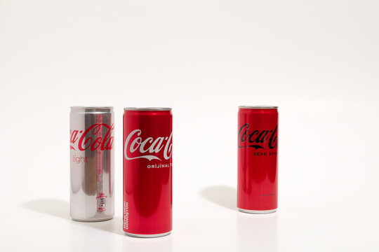 Coca-cola cans on the white background. - Istanbul, Turkey, 26 march 2023