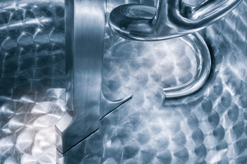 Industrial open food meat  mixer with knives in food industry close-up. Industrial open mixer in food industry close-up