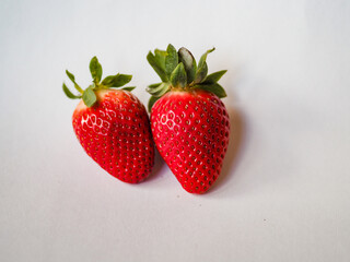 Strawberry on white background. Fresh sweet fruit closeup