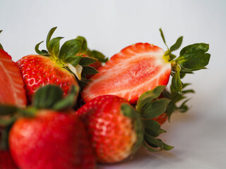Strawberry on white background. Fresh sweet fruit closeup
