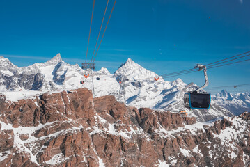 The highest gondola in the Alps, rising to a 3883m to the Glacier Paradise point. Beautiful Swiss mountains.  © Aerial Film Studio