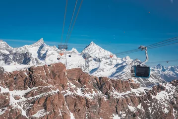 Foto op Canvas The highest gondola in the Alps, rising to a 3883m to the Glacier Paradise point. Beautiful Swiss mountains.  © ingusk