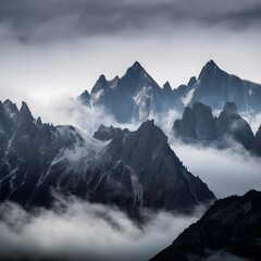 majestic sharp peaks with fog surrounding