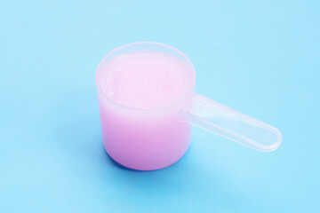 Fabric softener on blue background.