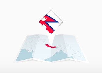 Nepal is depicted on a folded paper map and pinned location marker with flag of Nepal.
