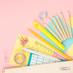 Square banner of stationery items for girls or women on light pink background. Back to school. Female Student's, pupil's or engineer's supplies. Office objects on pastel pink background