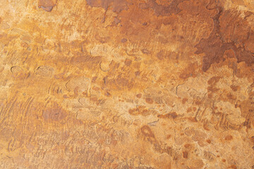 Natural rusty stone background. Slate close-up as a background.