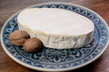 French white mold soft cow milk cheese Caprice des Dieux from Haute-Marne region, France