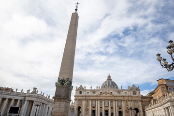 Fototapeta na wymiar Saint Peter basilica and obelisk in Saint Peter square, Vatican city, Rome, Italy