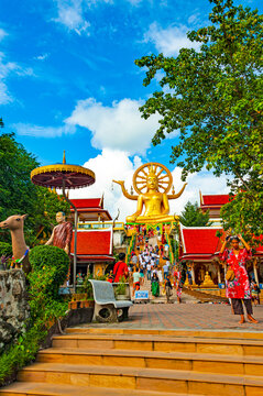 Koh Samui, Thailand - December 30, 2018: big Buddha Temple sits on a small rocky island off Koh Samui , its golden, 12-metre-tall seated Buddha statue is one of the islands most popular attractions