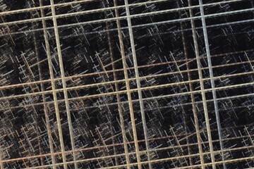 Orange gray pattern of intersecting lines on a black background. Abstract fractal 3D rendering