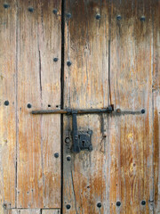 antique wooden door with iron bolt in Gran Canaria