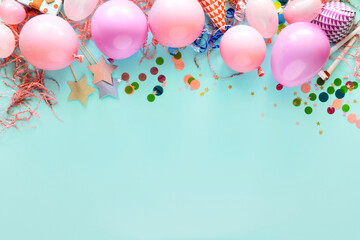 Flat lay decoration party on pastel blue background with copy space top view