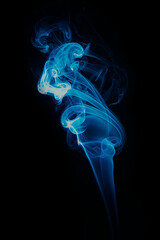 swirl of blue smoke isolated on black background