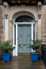 Fototapeta na wymiar The doors of Edinburgh - grey closed