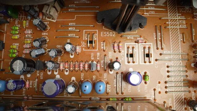 Old board with radio components. Dolly shot. Close-up