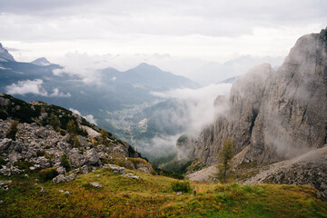 Dirty road and hiking trail in Dolomites mountains, Italy