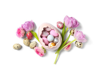 Composition with Easter eggs and beautiful flowers on white background
